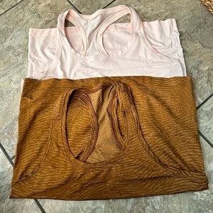 Lululemon Swiftly Tech Raceeback tank. Full length. Selling as a pair